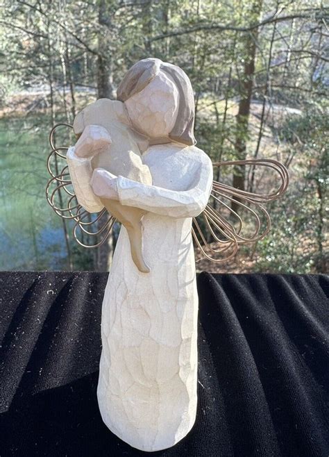 willow tree angel with dog|willow tree angel of kindness.